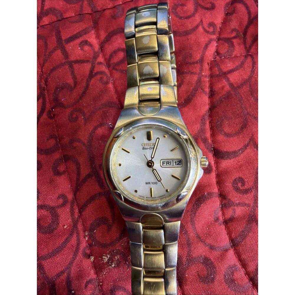 Citizen Eco-Drive WR100 Women's Two-Tone Watch White Dial Day-Date E101-K17586